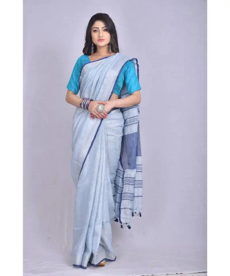 Light blue linen saree with blouse with zari border