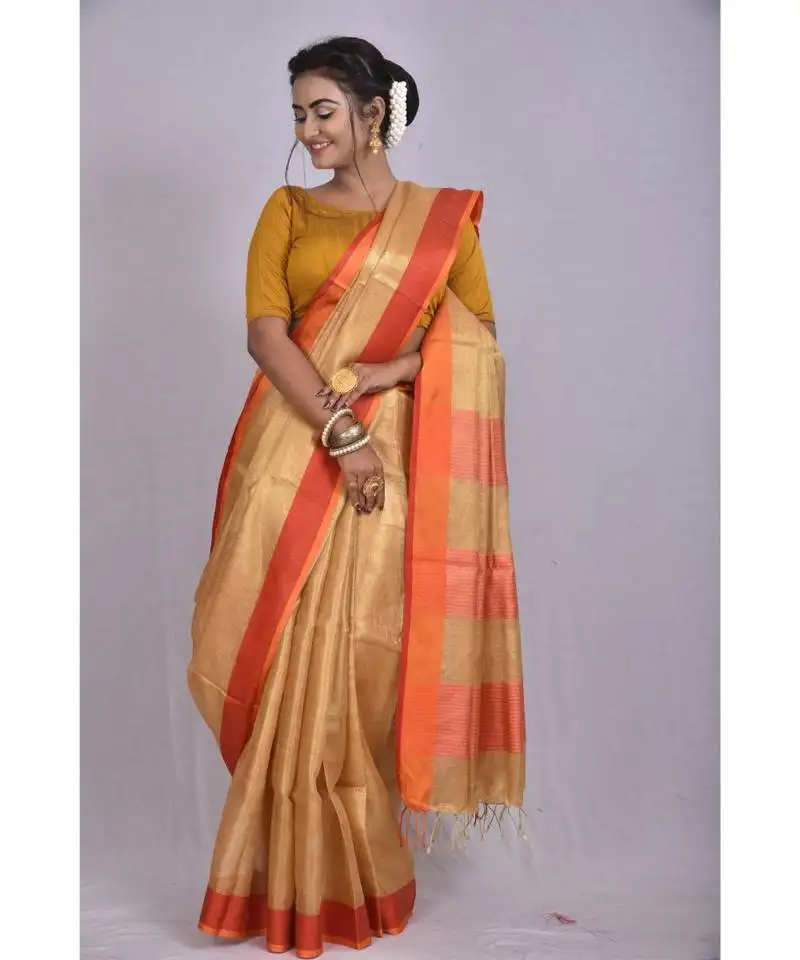 Beige shade tissue linen saree with blouse with contrast border