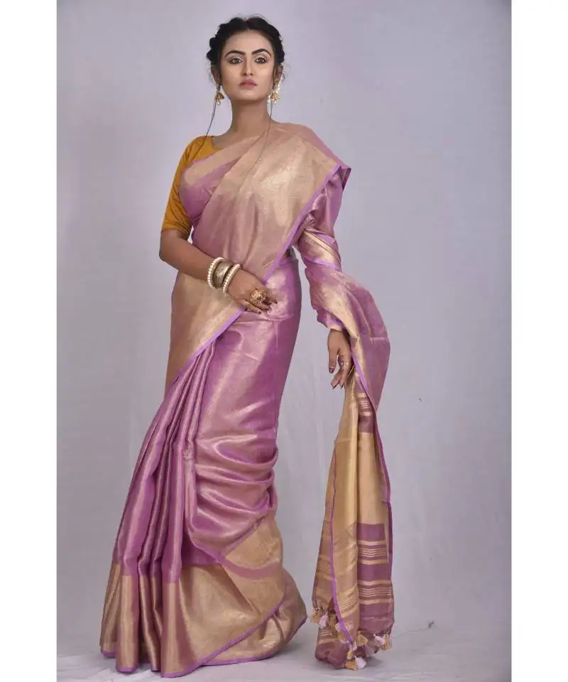 Light lavendar tissue linen saree with blouse with broad zari border