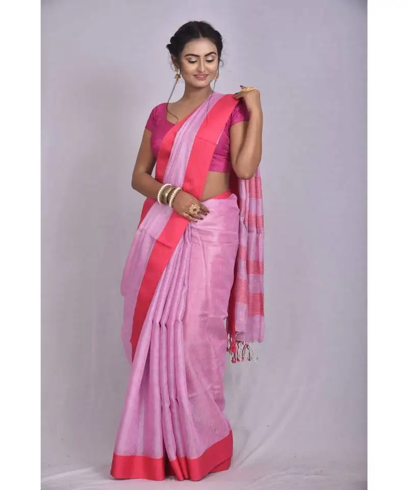 Light pink tissue linen saree with blouse with contrast border