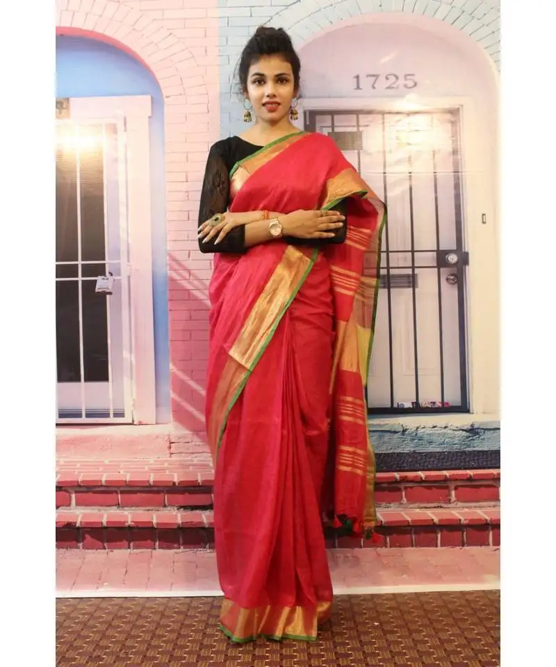 Red linen saree with blouse with zari border