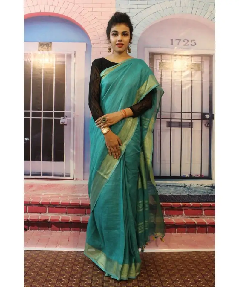 Blue linen saree with blouse with zari border