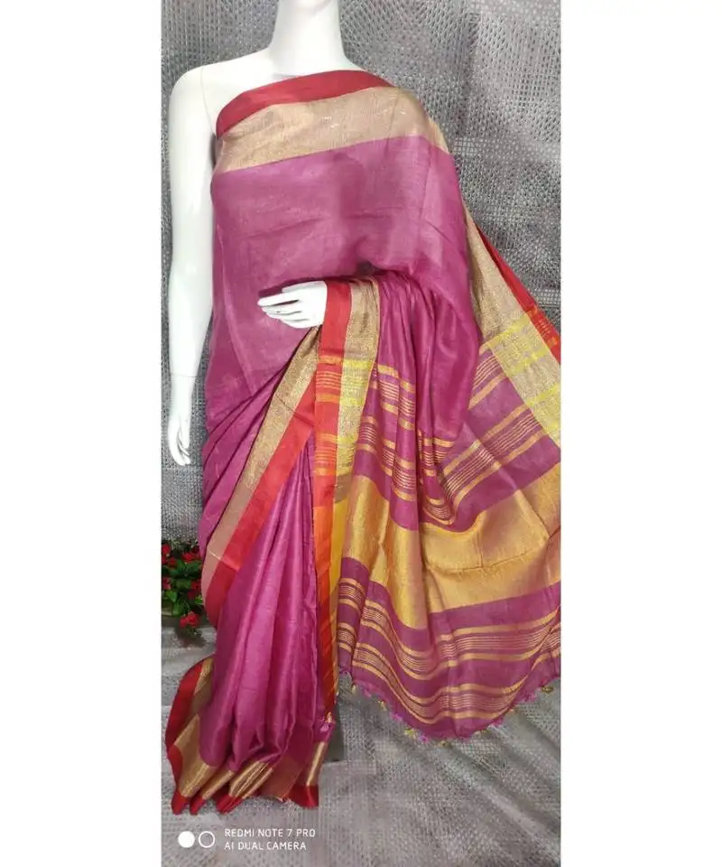 Pink linen saree with blouse with broad zari border