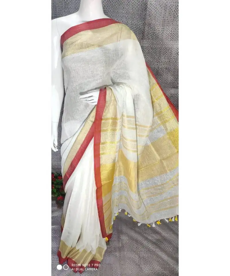 White linen saree with blouse with broad zari border