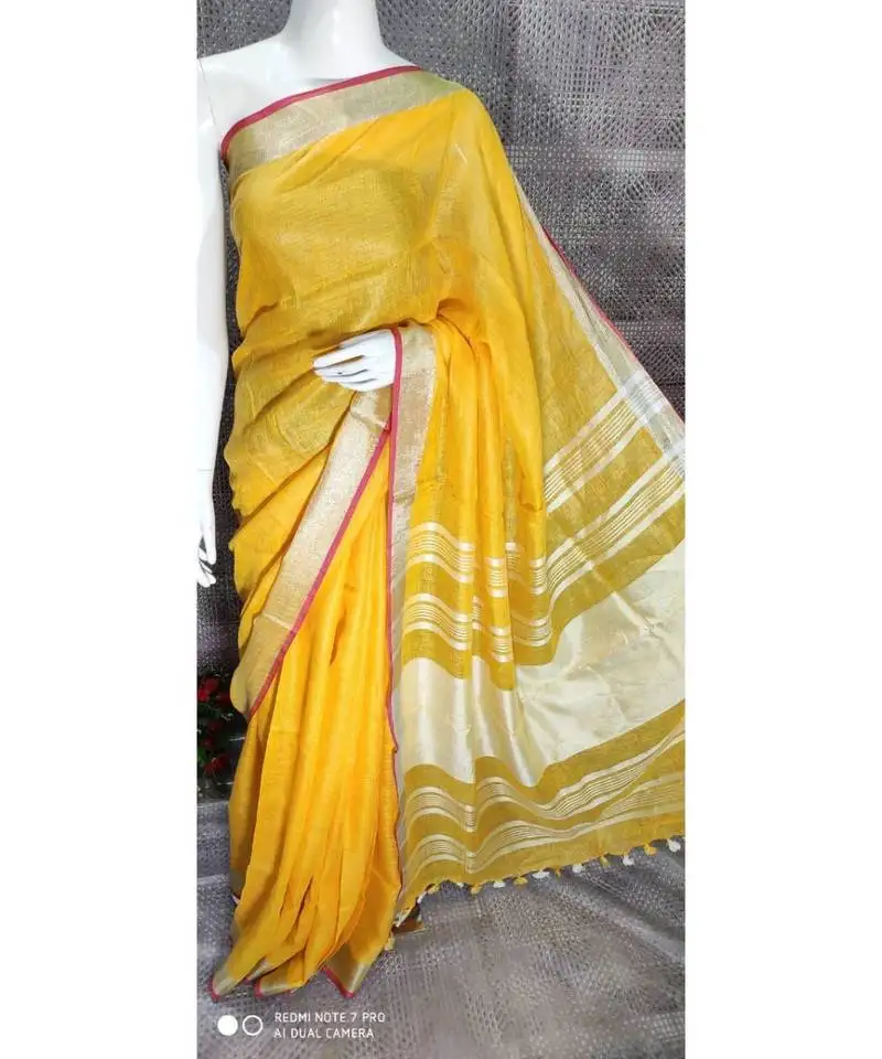 Yellow linen saree with blouse with zari border