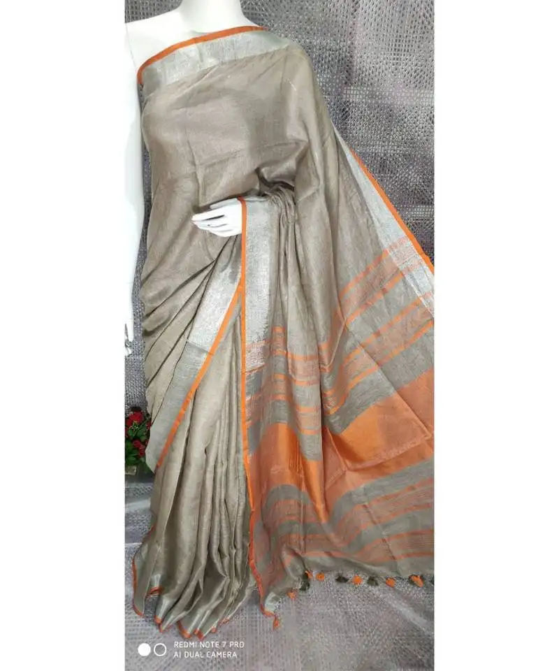 Beige grey linen saree with blouse with zari border