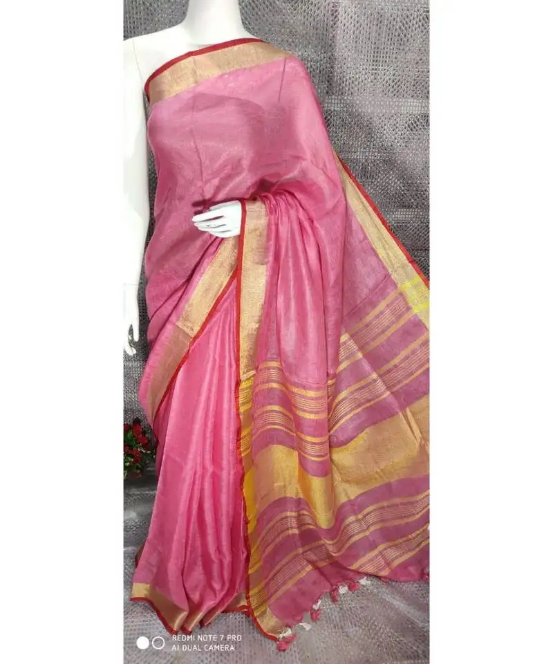 Pink shade linen saree with blouse with zari border