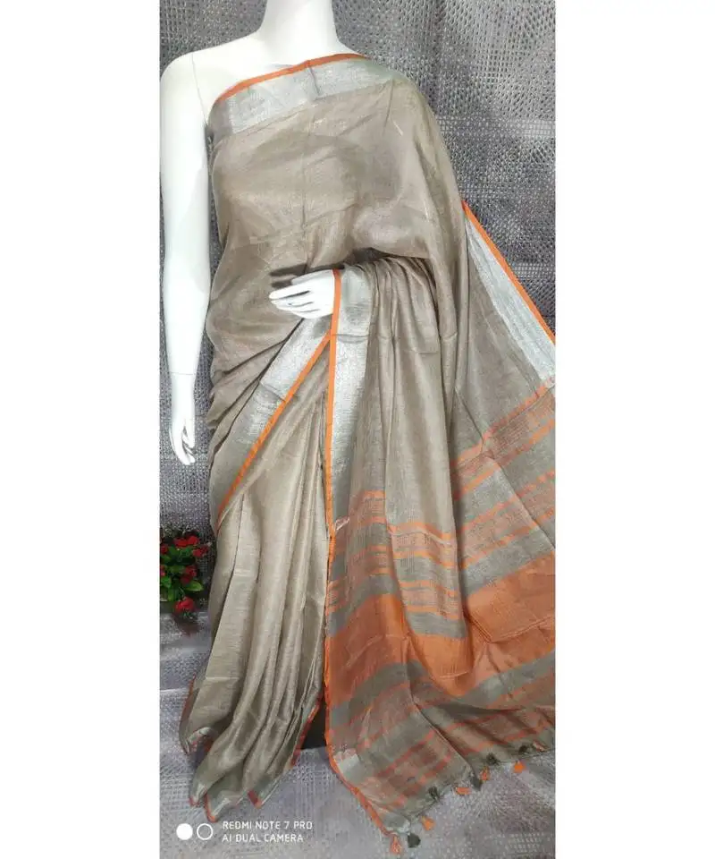 Beige ash shade linen saree with blouse with zari border