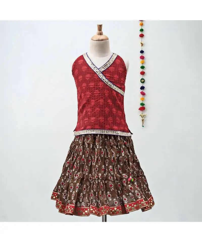 Mahroon and red cotton lehenga with a self print contrast halter neck choli and gota patti lace