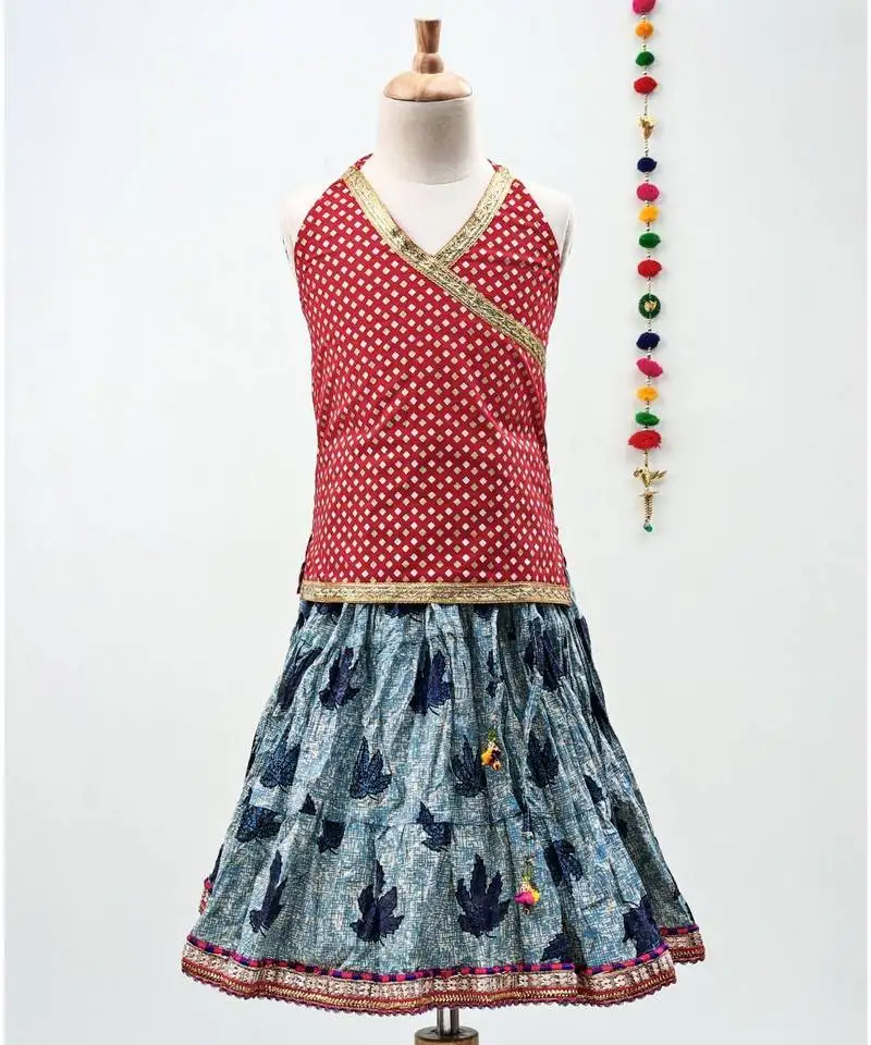 Blue and red cotton leaf printed lehenga with a contrast choli and golden lace