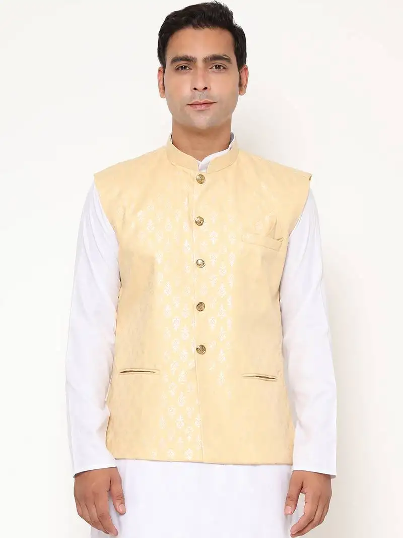 Yellow nehru jacket with golden floral motif accents.