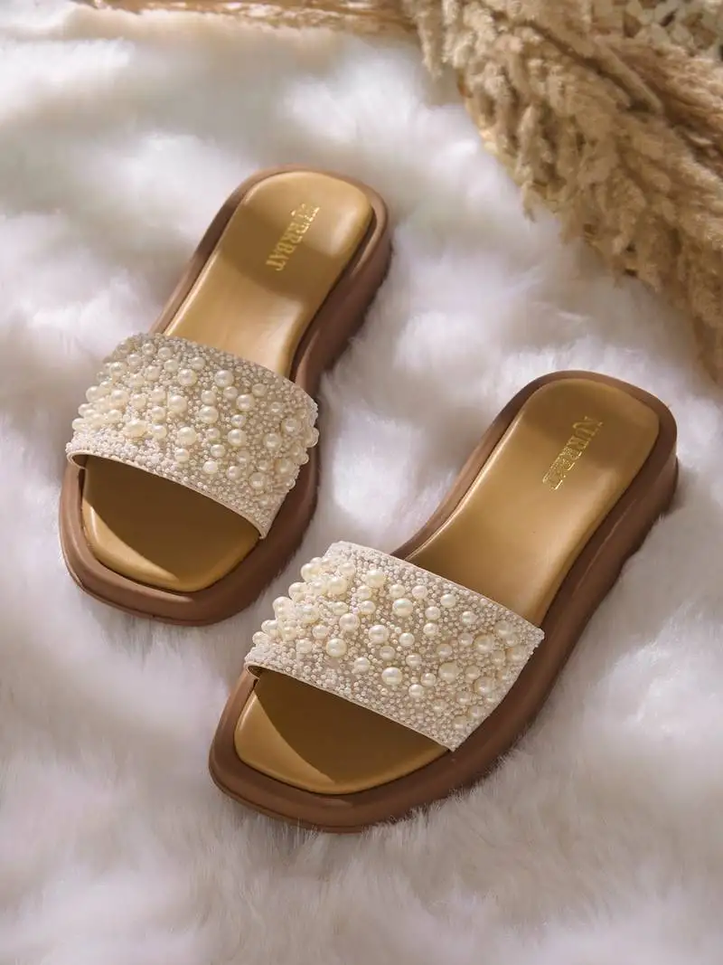 White embroidered leather sandals