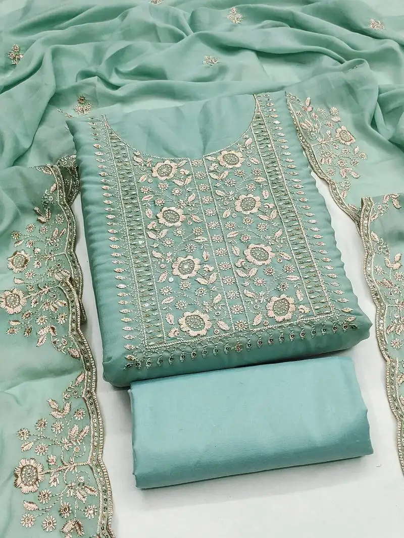 Elegant turquoise embroidered suit – perfect for festive & wedding occasions unstitched