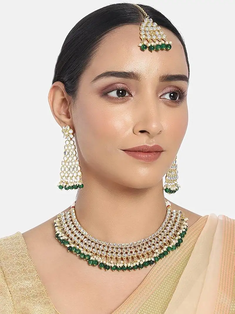Traditional handcrafted faux kundan & pearl studded necklace set with earrings & maang tikka