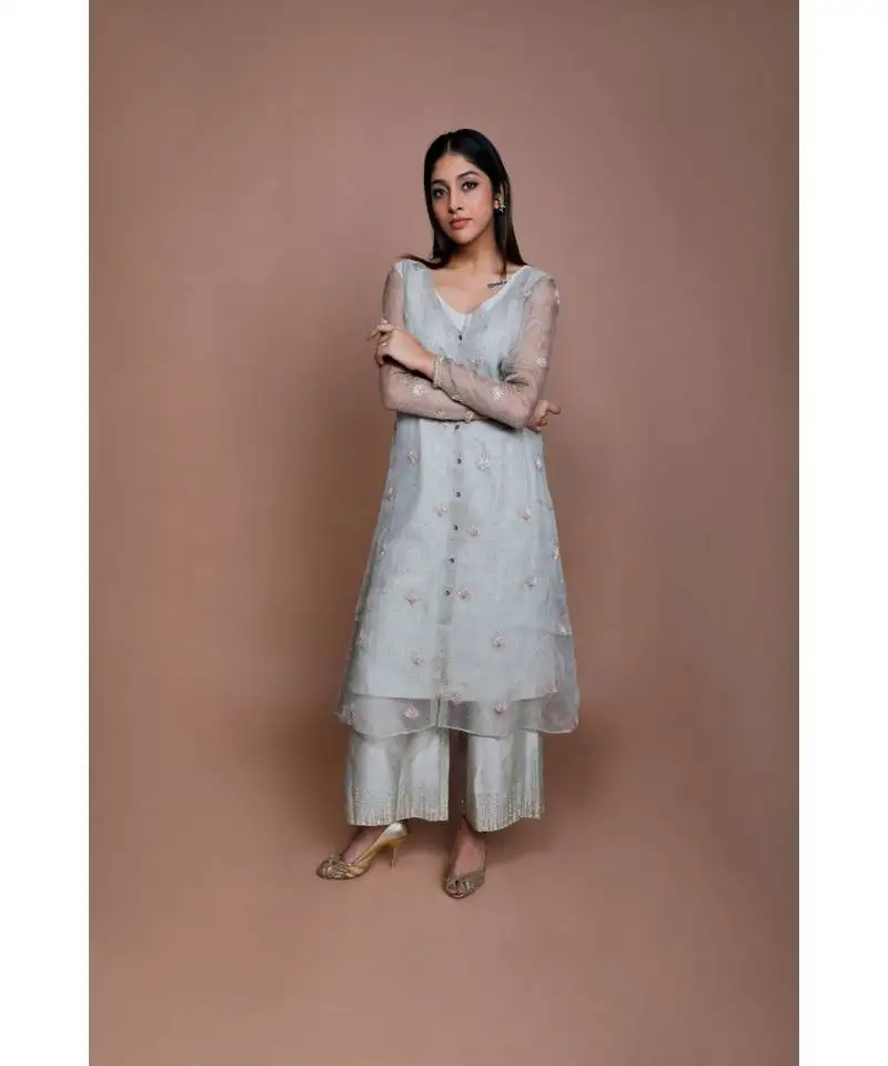 Show shaa sea green chnaderi floral sheer overall with geometrical stripe tunic and embroided pants.