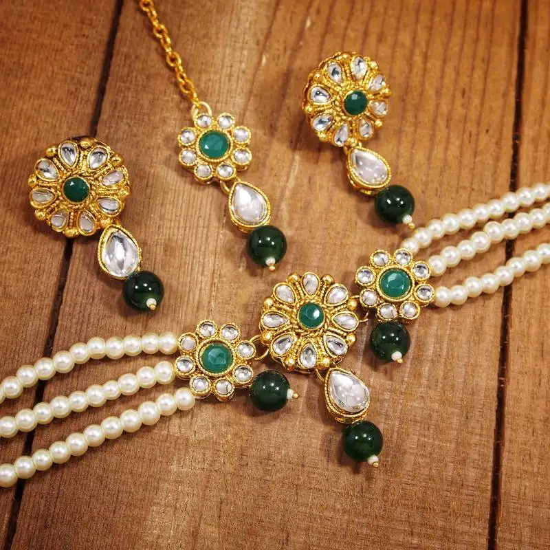 Traditional gold plated floral pearl & kundan choker necklace set with maang tikka for women