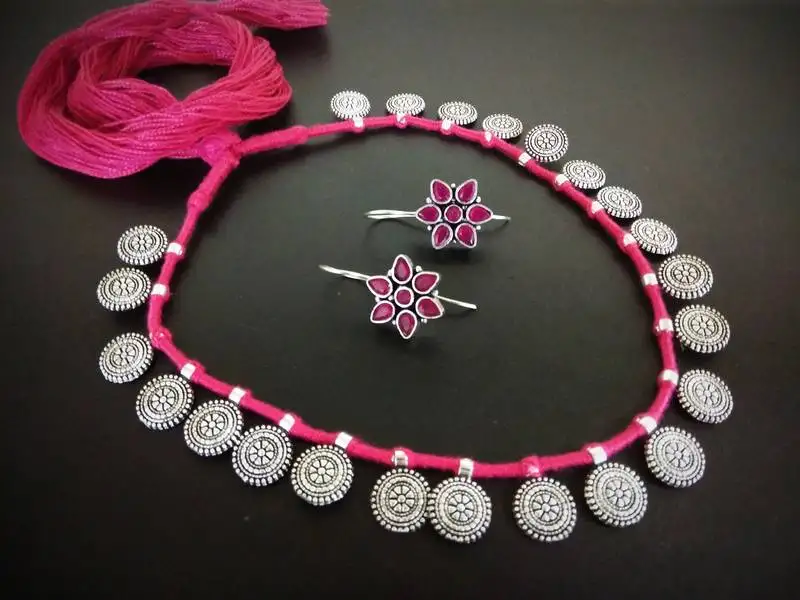 Pink tassle coin interlaced set with kundan earring