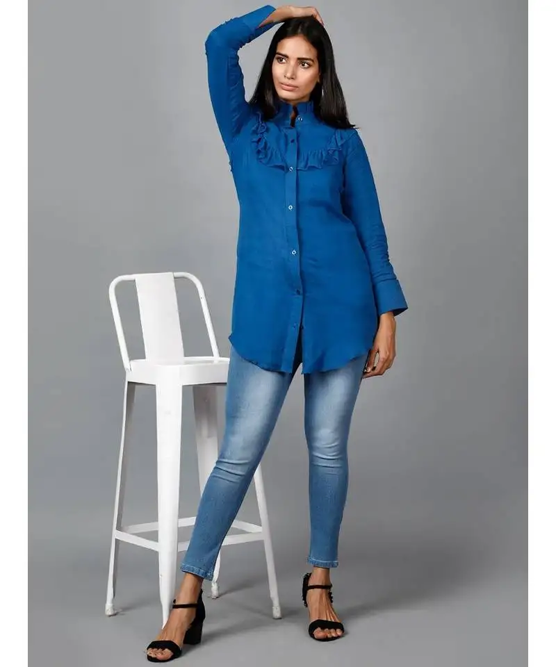 Blue shirt with ruffle yoke and cuff