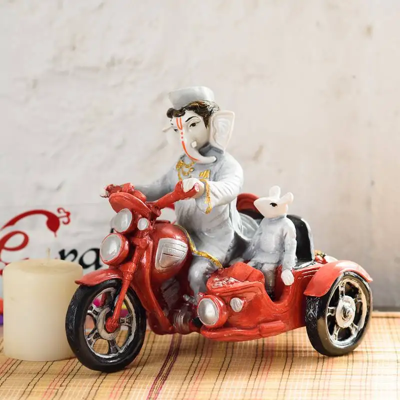 Shri ganesh on scooter statue showpiece