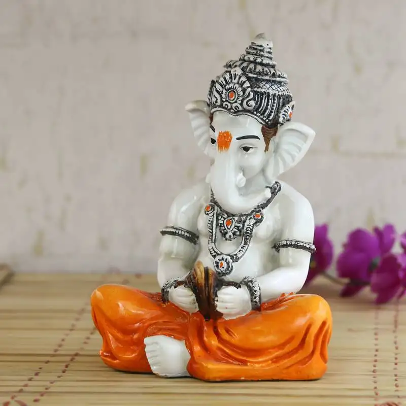 Lord ganesha playing manjeera decorative showpiece