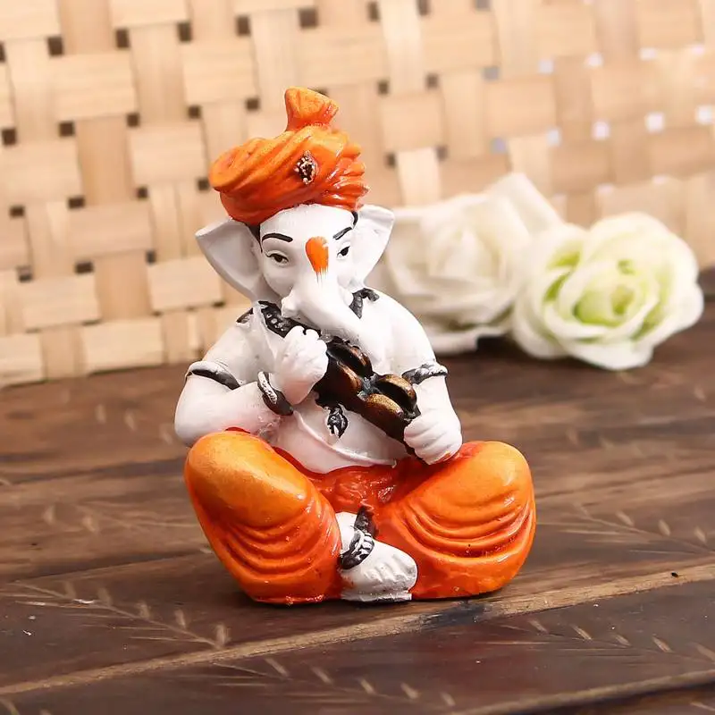 Lord ganesha showpiece playing kartal