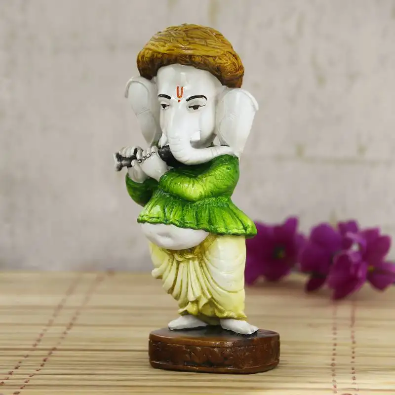 Lord ganesha playing instument decorative showpiece