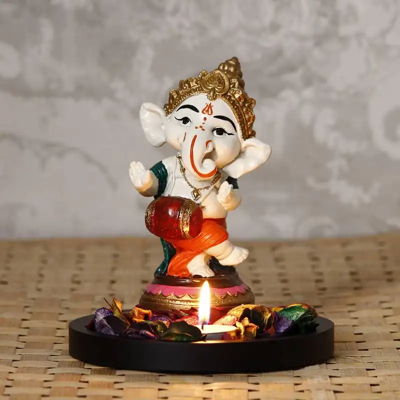 Ecraftindia colorful lord ganesha dancing avatar decorative showpiece with wooden base, fragranced petals and tealight