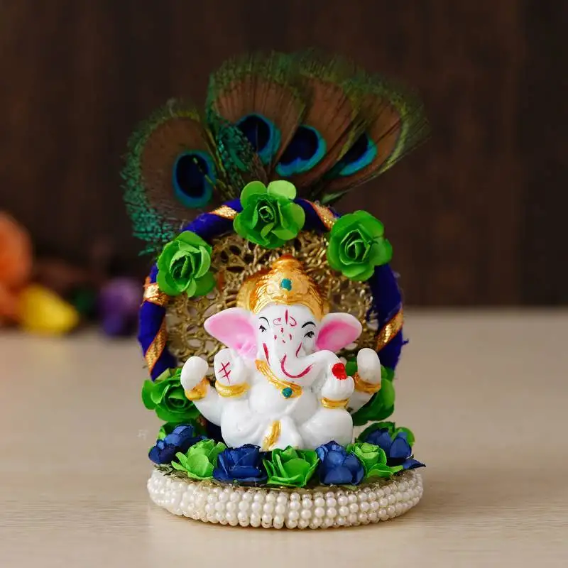 Ecraftindia lord ganesha idol on decorative handcrafted floral plate with peocock feather for home and car
