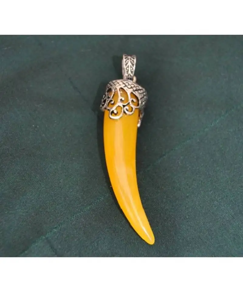 Yellow horn shaped pendant