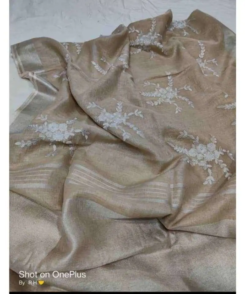 Grey ?handcrafted?linen saree with embroidery work
