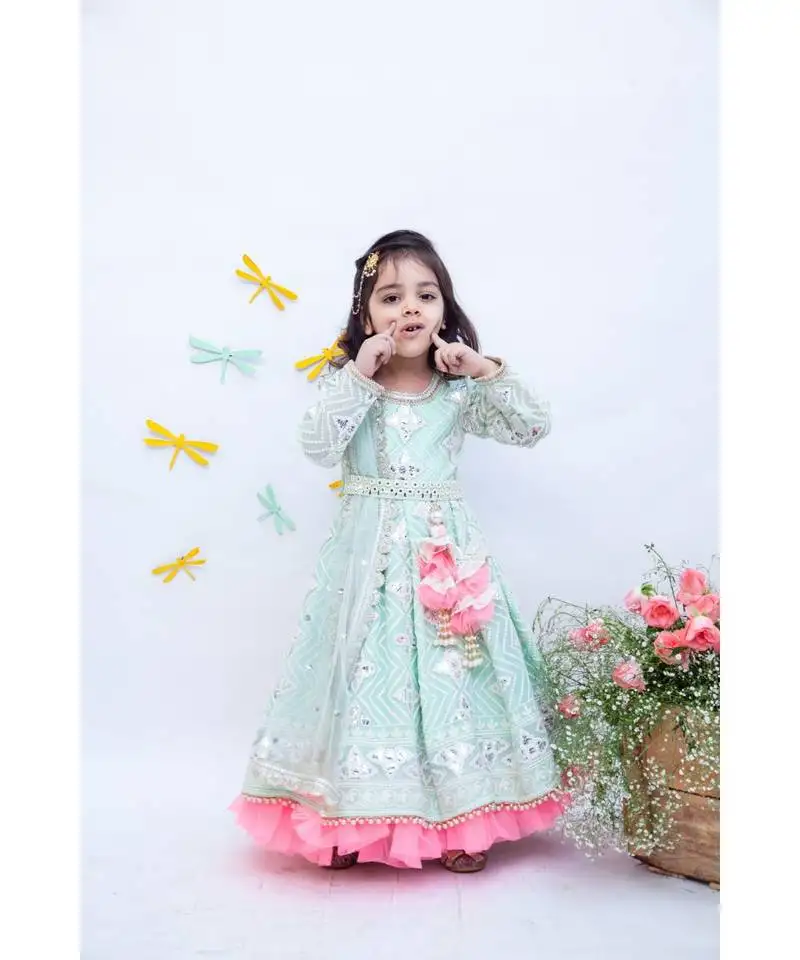 Green floral print jacket with pink kurta and dupatta