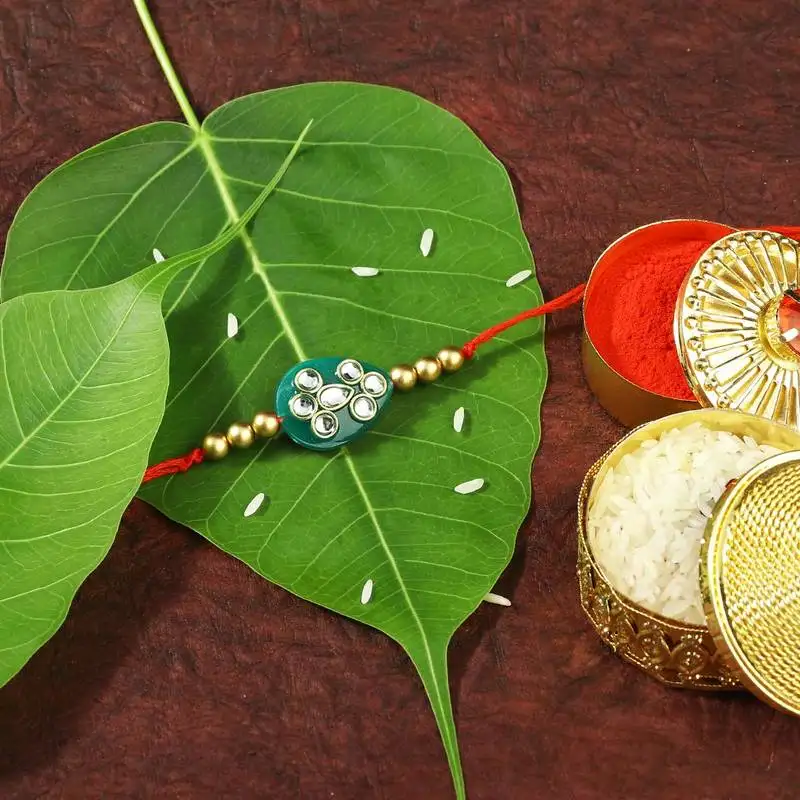 Gold plated designer pearl kundan rakhi for men::Boys