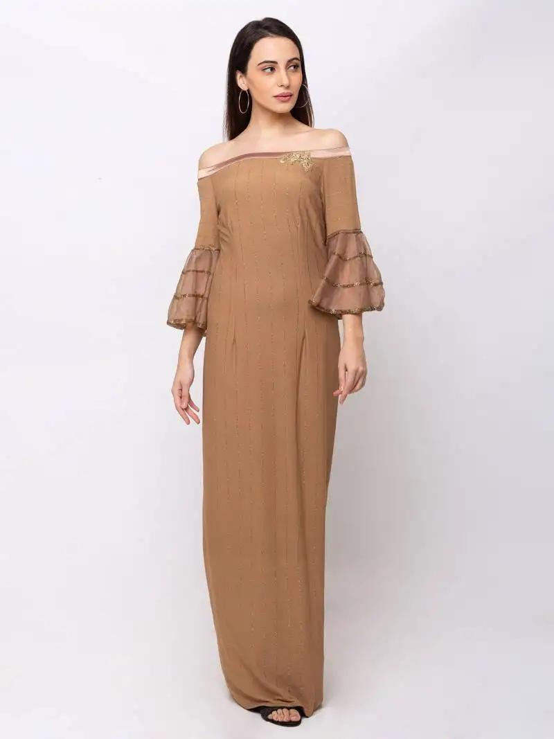 Sheczzar brown color knitted floor length party wear gown.