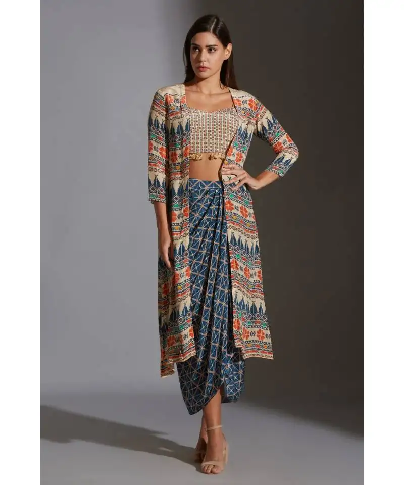 Printed bustier with tassel detail paired with dhoti drape skirt and jacket