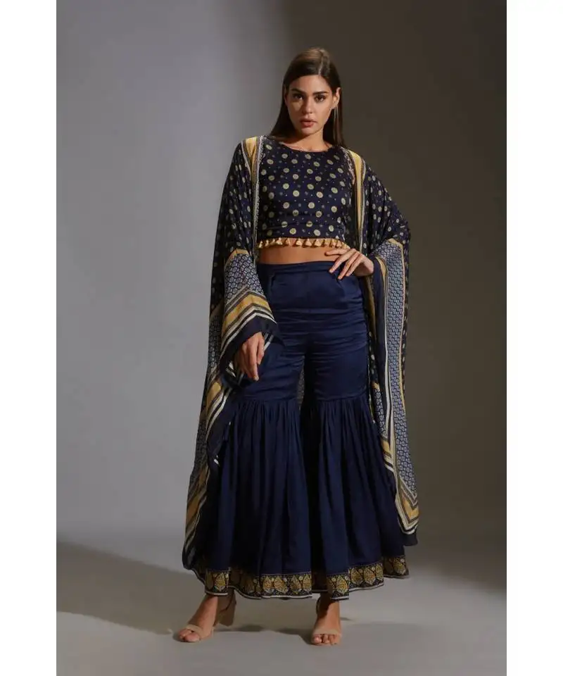 Garara paired with incut printed crop top which has tassel details.