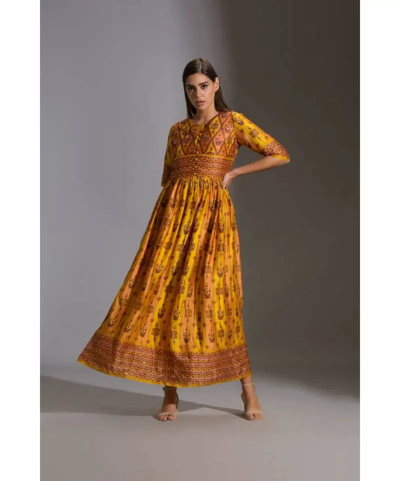 Printed dress paired with sleeveless jacket