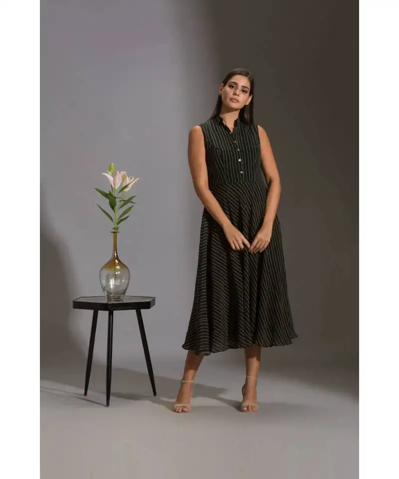 Printed a line dress paired with sequence jacket