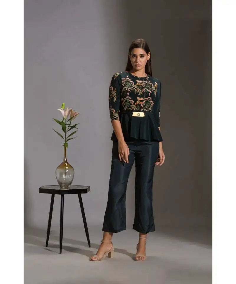 Printed sequence peplum top paired with pants