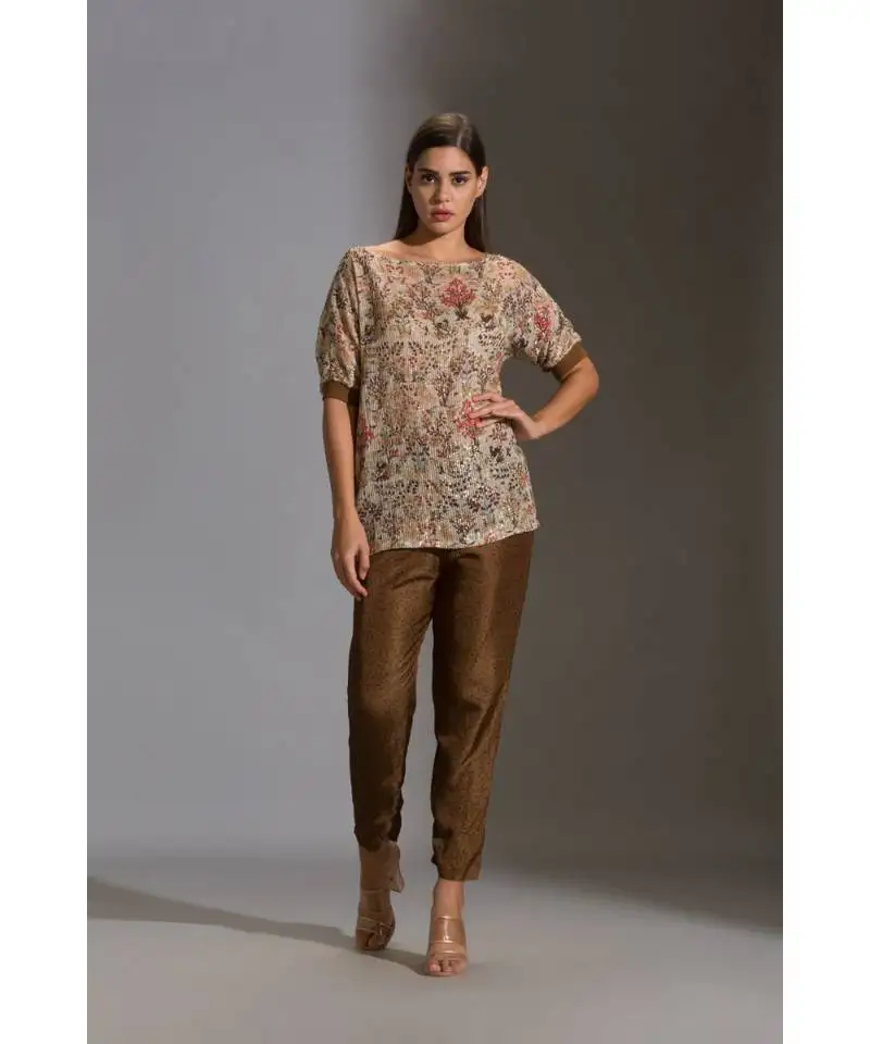Prired one shoulder top paired with printed pants