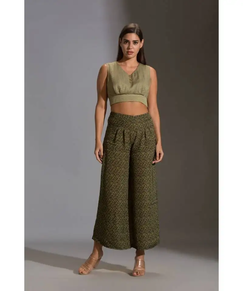 Printed crop top paired with printed flared pants and rushed jacket