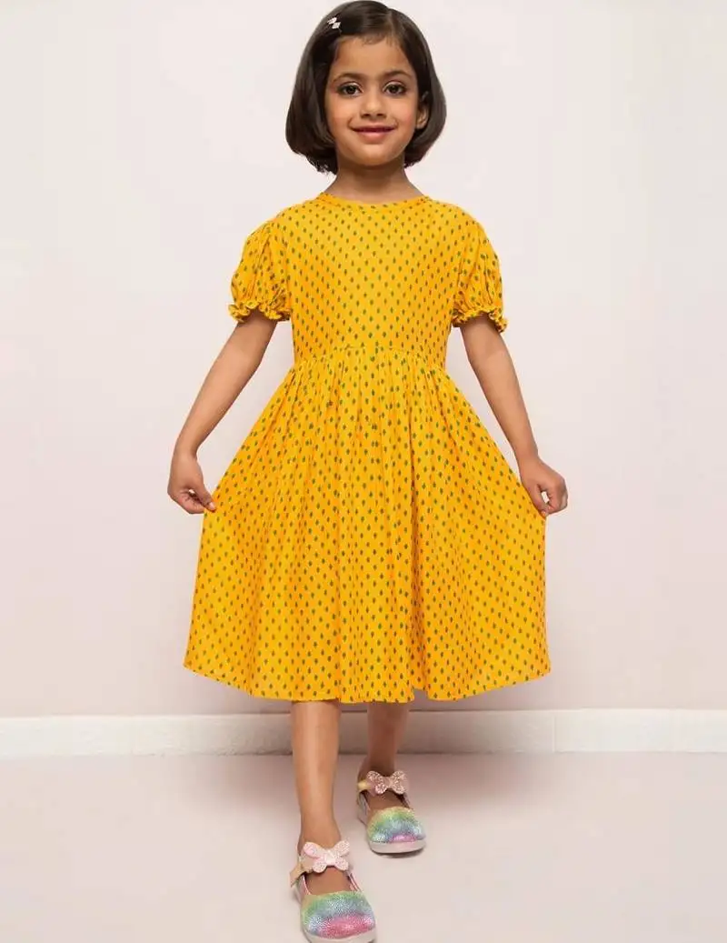 Printed frock in rayon fabric with elasticated sleeves