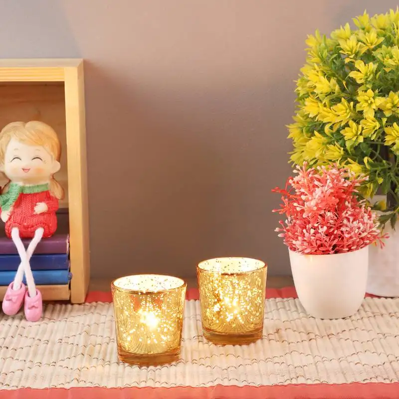 Set of 4 golden glass votive