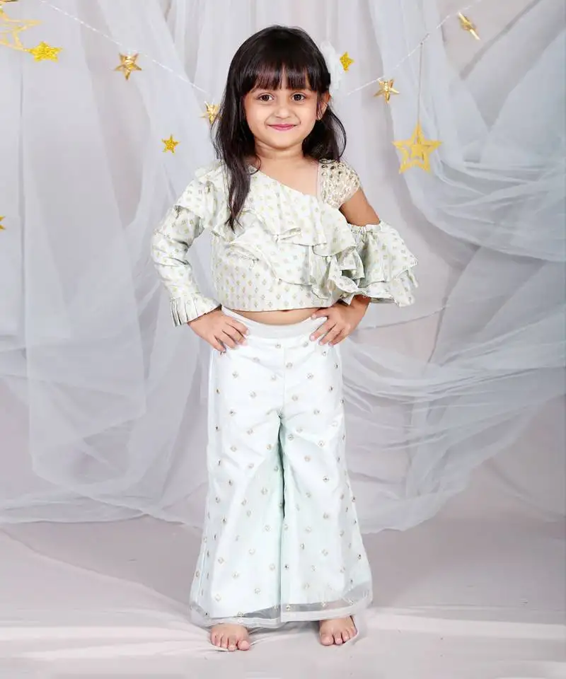 Top with various cuts along with attached dupatta and palazzo at bottom