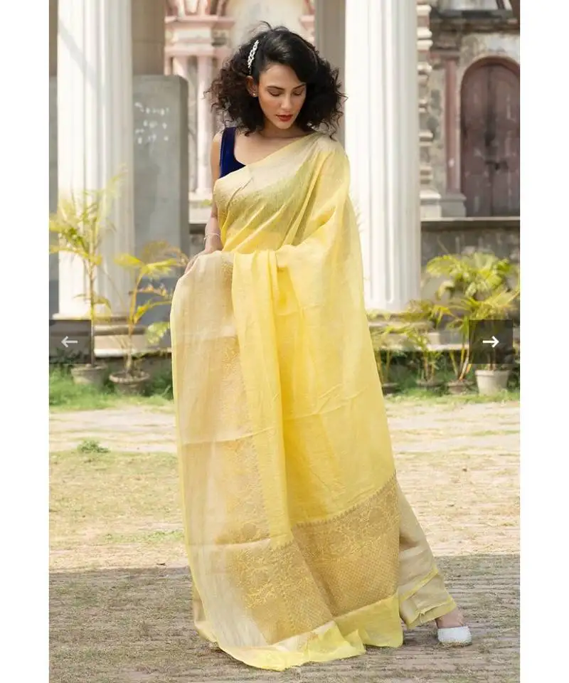 Yellow banarsi linen saree with blouse piece