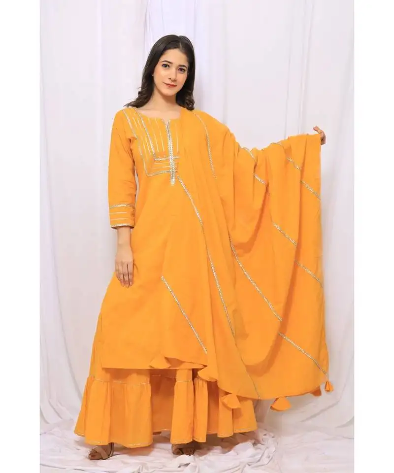 Yellow solid color with gota embellished pure cotton kurti dupatta skirt set for women