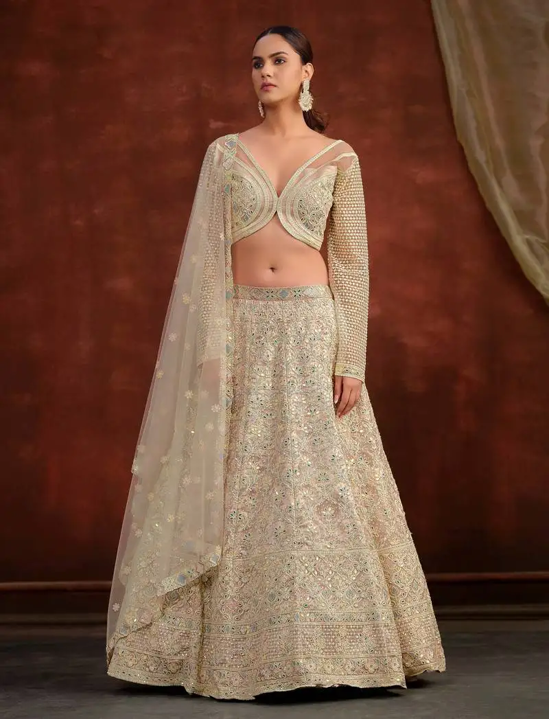 Cream net silk bridal wedding lehenga with heavy embroidery blouse