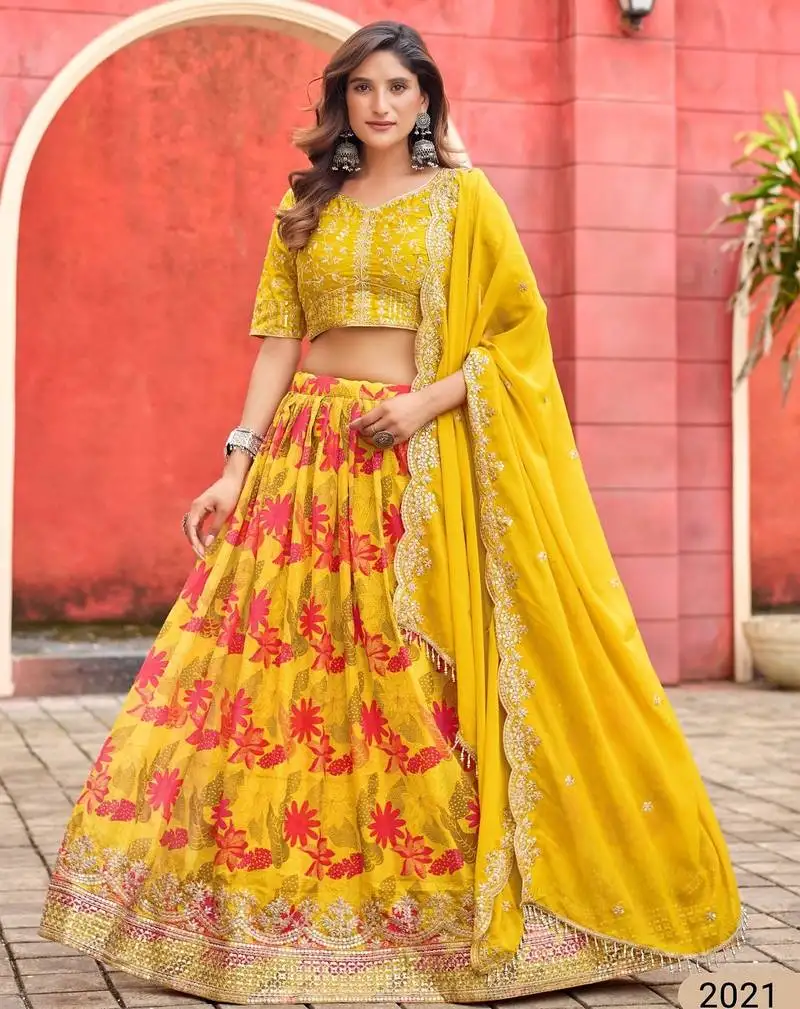 Yellow art silk semi stitched lehenga choli with taby silk print