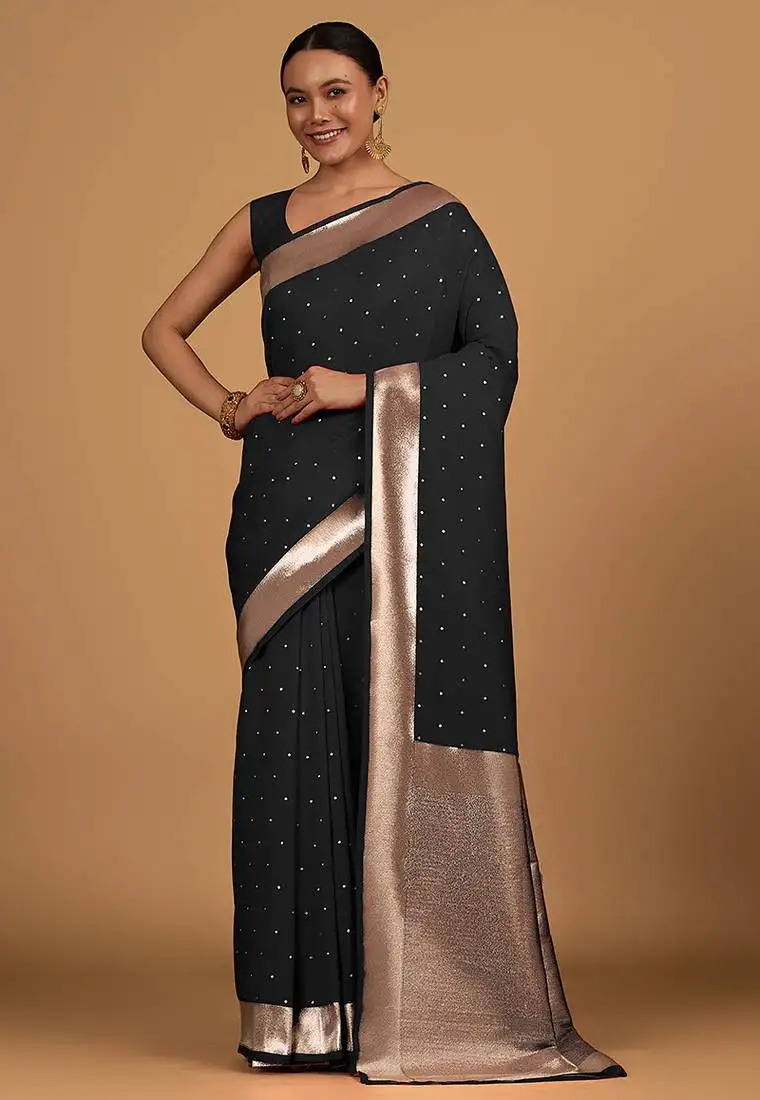 Black color elegant banarasi silk saree with gold zari weaving work comes with unstitched blouse piece