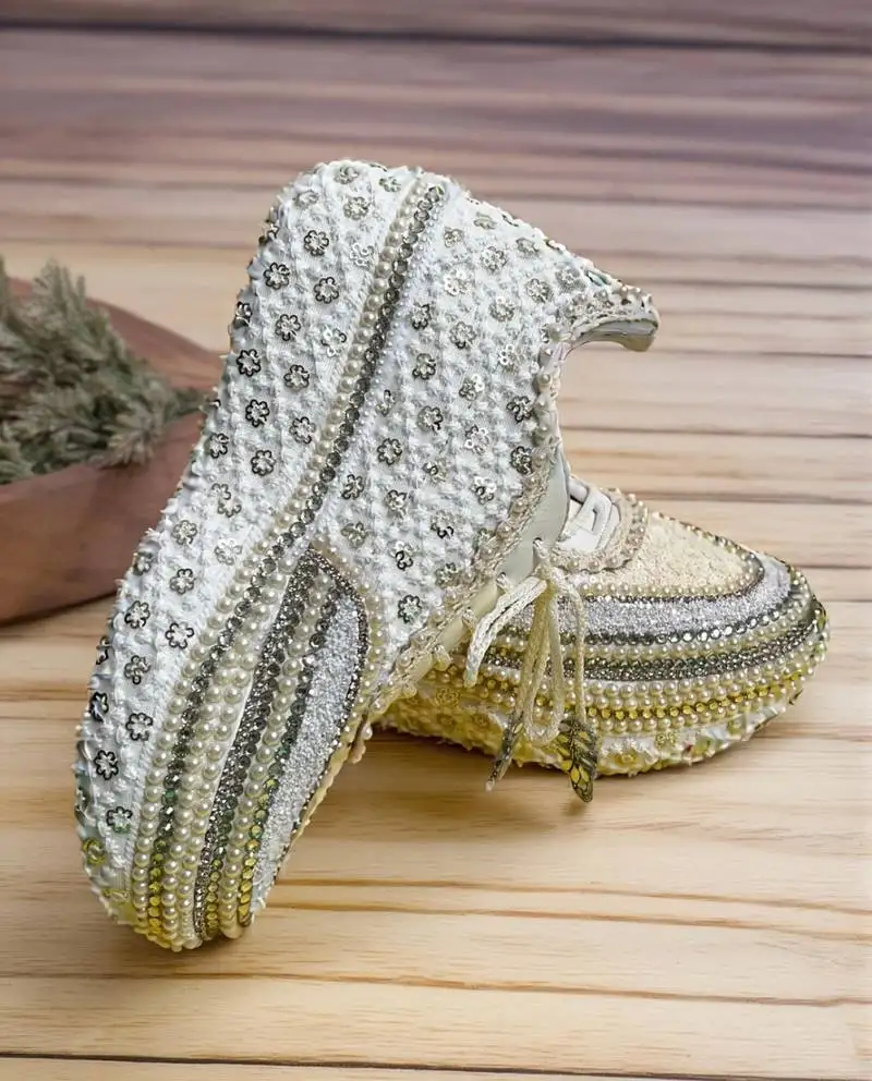 Ivory solid synthetic sneakers