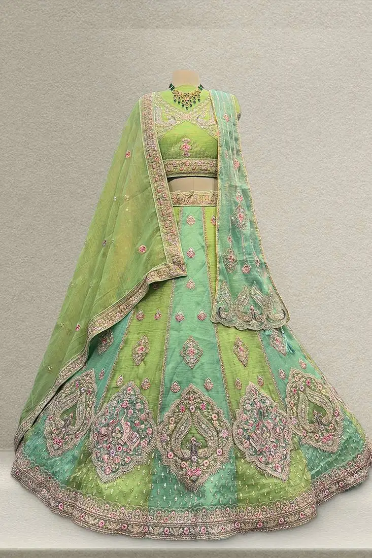 Green zari resham tissue work lehenga with unstitched blouse